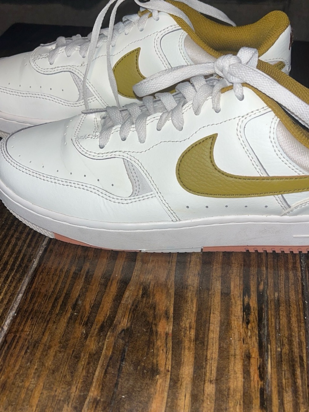 Nike White Low-Top Sneakers with Mustard Swoosh